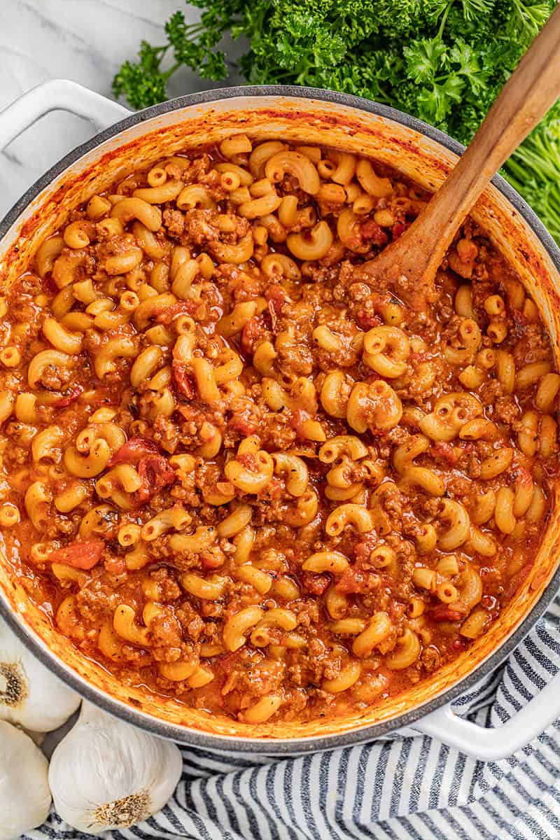 Overhead view of a stockpot filled with goulash.
